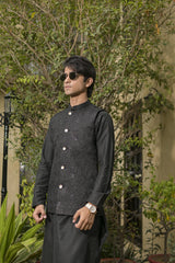 Black waistcoad and black shalwar kameez