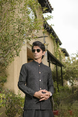 Black waistcoad and black shalwar kameez